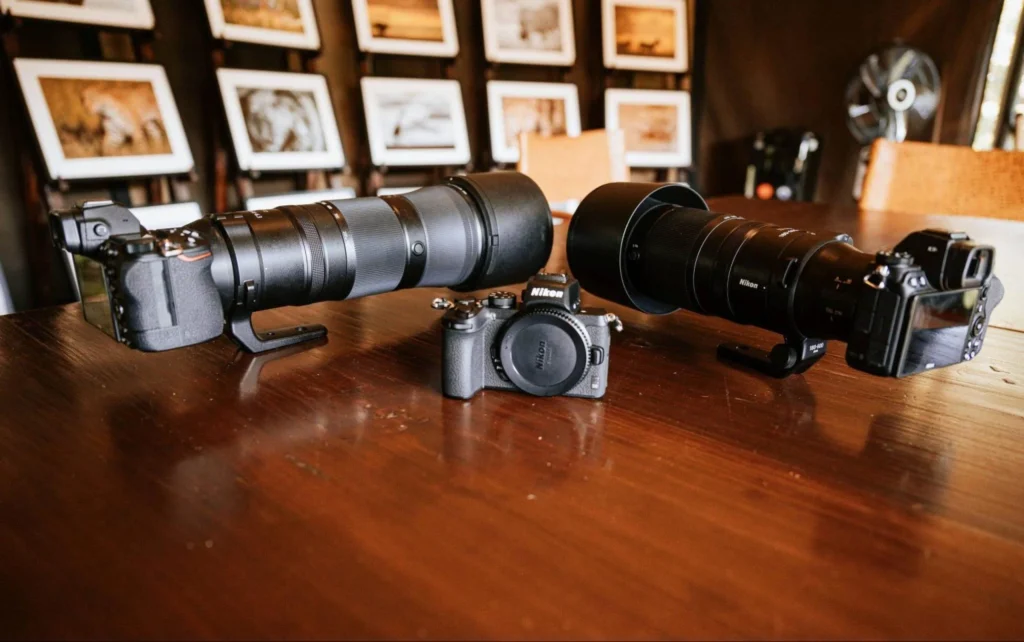 Professional Nikon cameras and telephoto lenses inside the Mara Bush Camp photographer lounge.